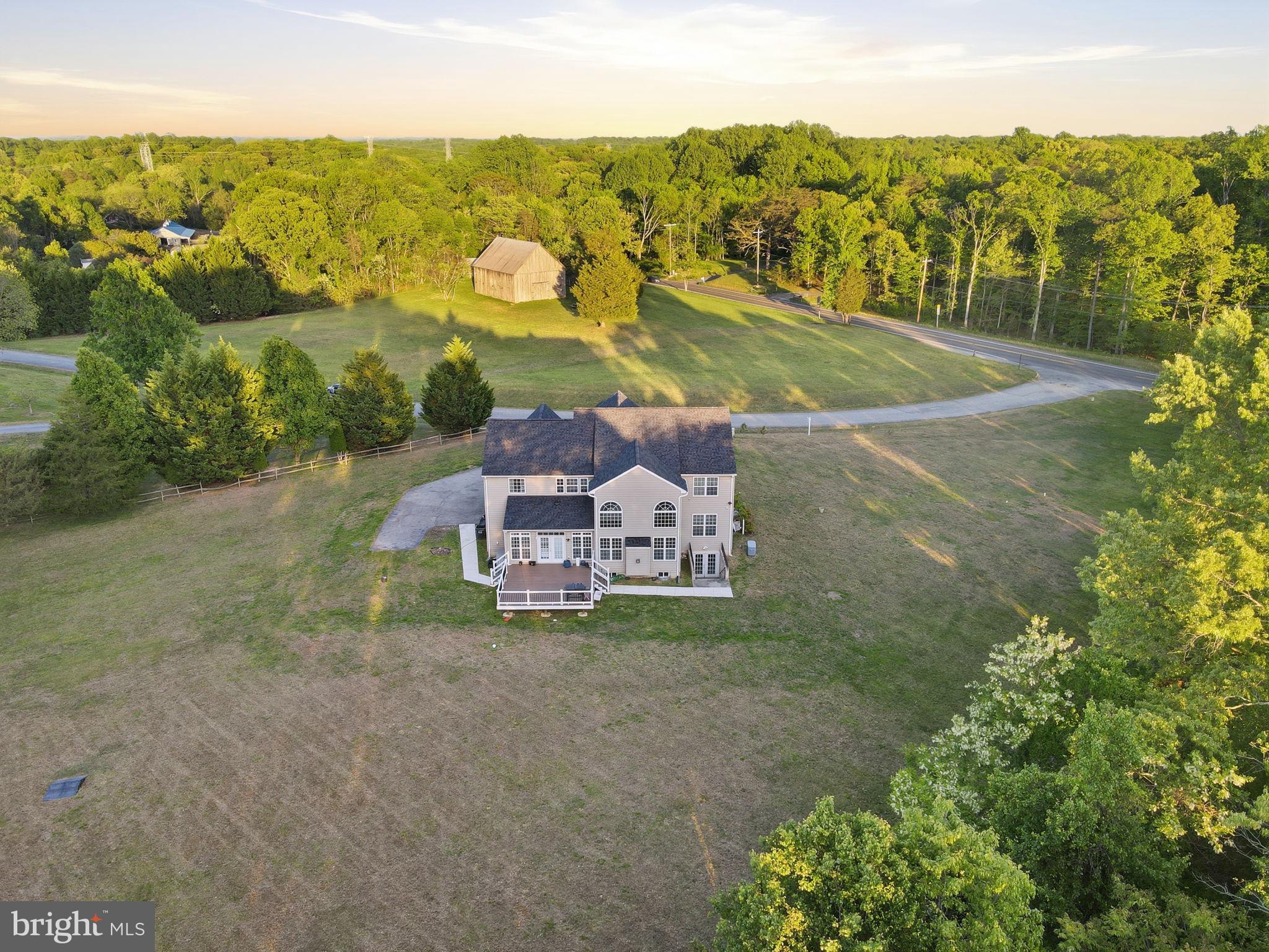19081 Poplar Ridge Road Brandywine, MD 20613 - Photo 7 of 64 an aerial view of residential houses with outdoor space and trees