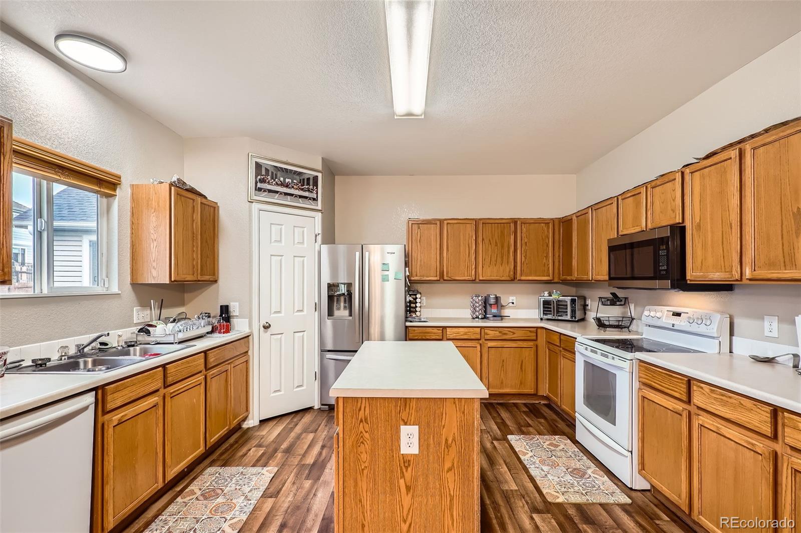 4426 Windmill Drive Brighton, CO 80601 - Photo 12 of 32