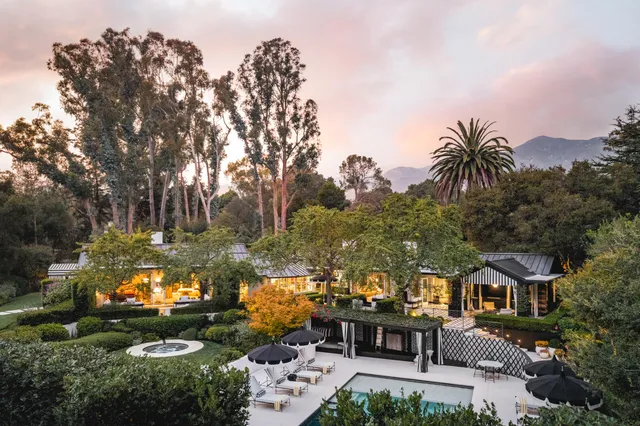 aerial view of a house with patio and garden