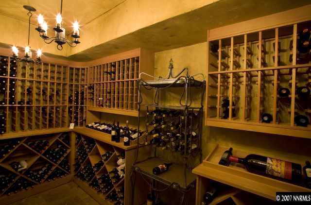2740 Holcomb Ranch Lane Reno, NV 89511 - Photo 5 of 7 a view of walk in closet with clothes and shoes