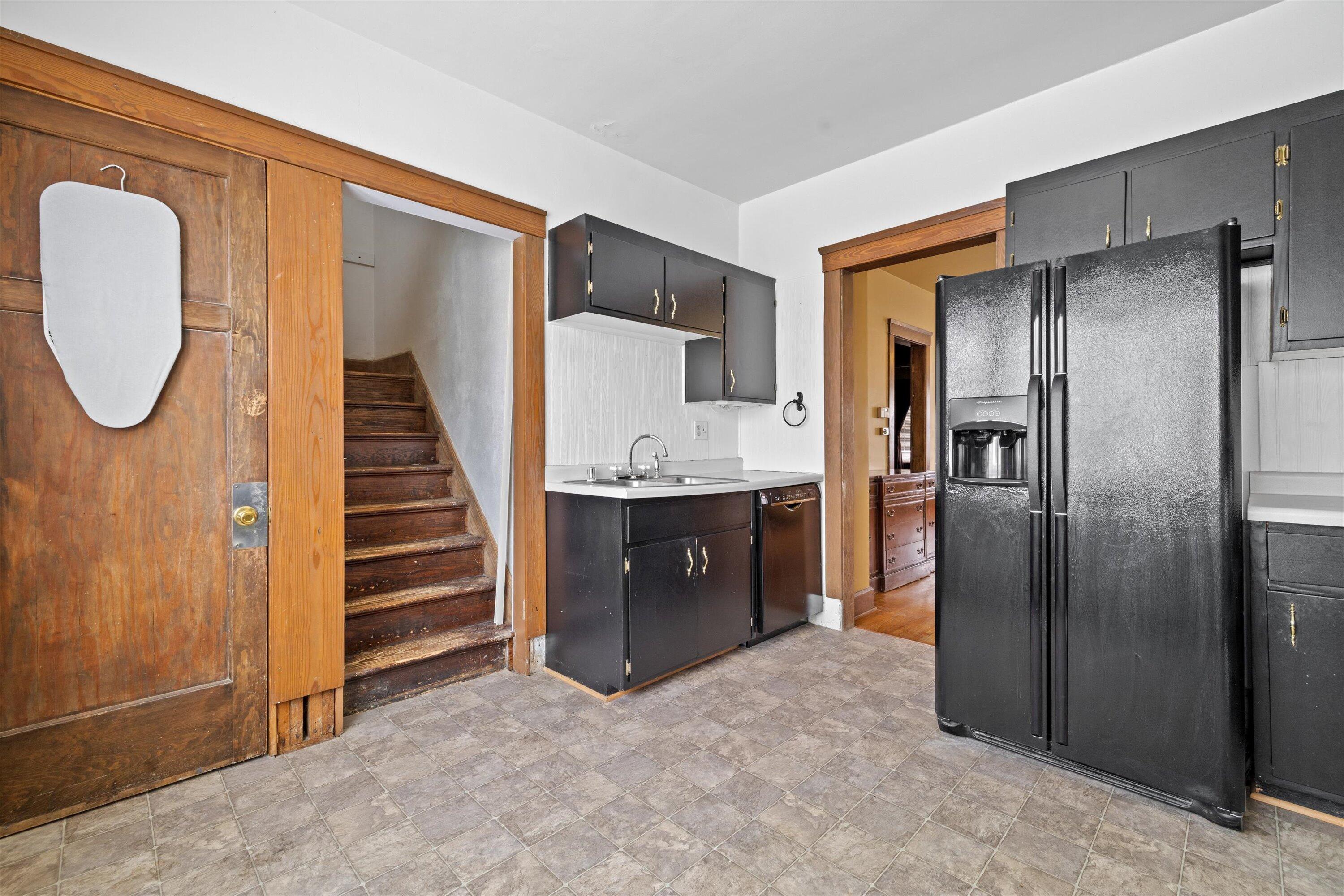 2410 Geneva Street Racine, WI 53402 - Photo 15 of 31 kitchen into upstairs