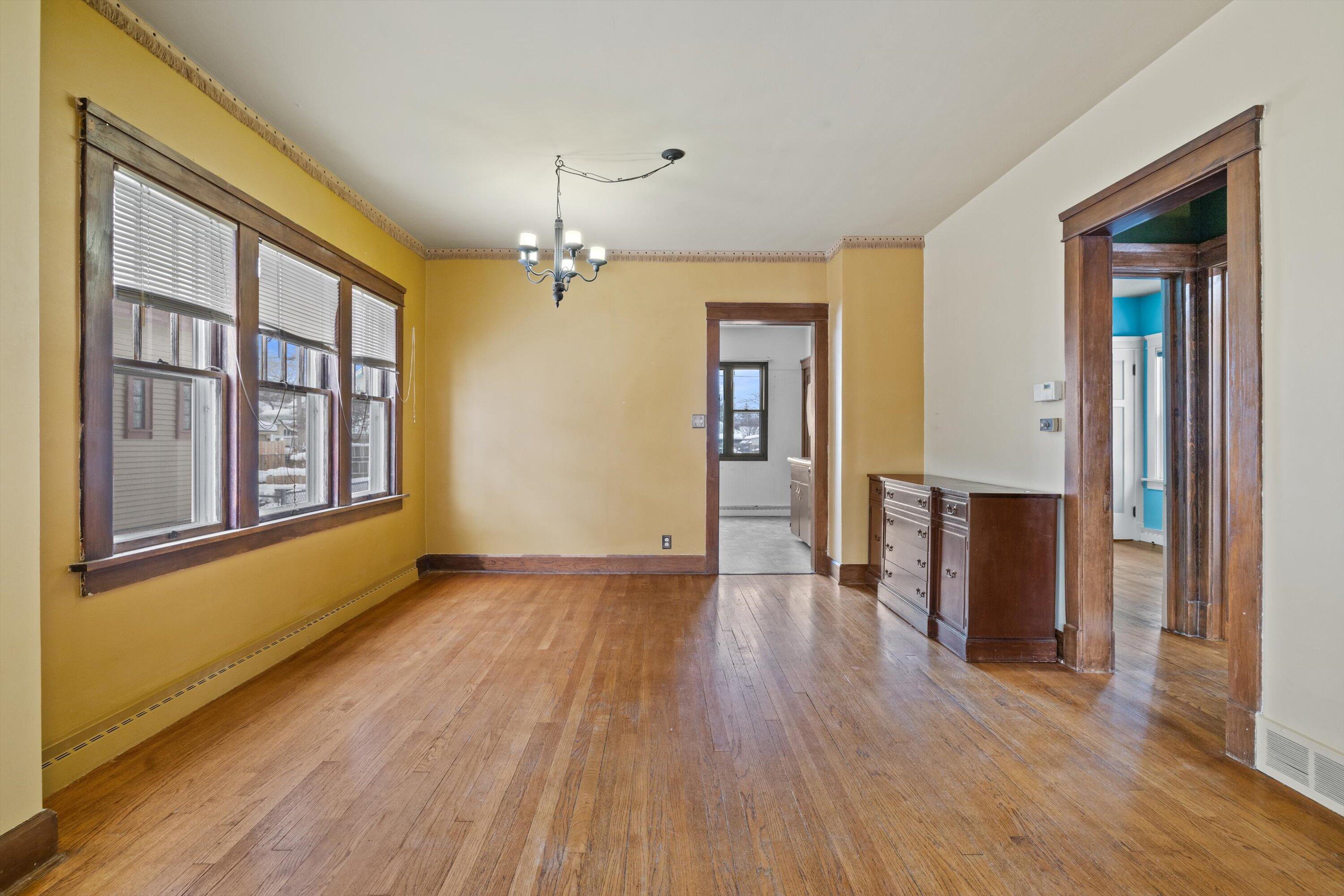2410 Geneva Street Racine, WI 53402 - Photo 6 of 31 dining into kitchen & hallway