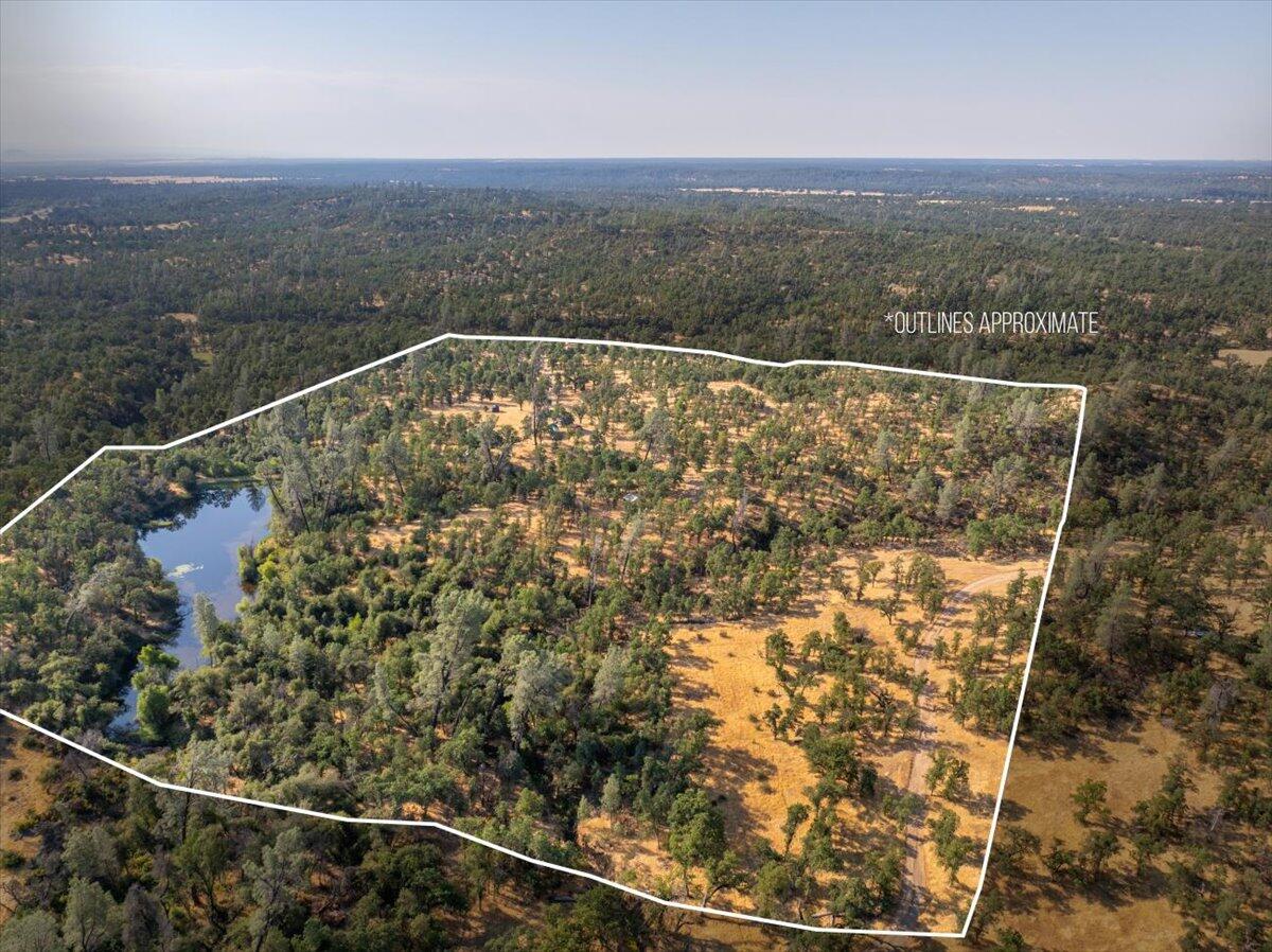 0 Two 2 Feathers Road Cottonwood, CA 96022 - Photo 1 of 41 an aerial view of mountain with lake view