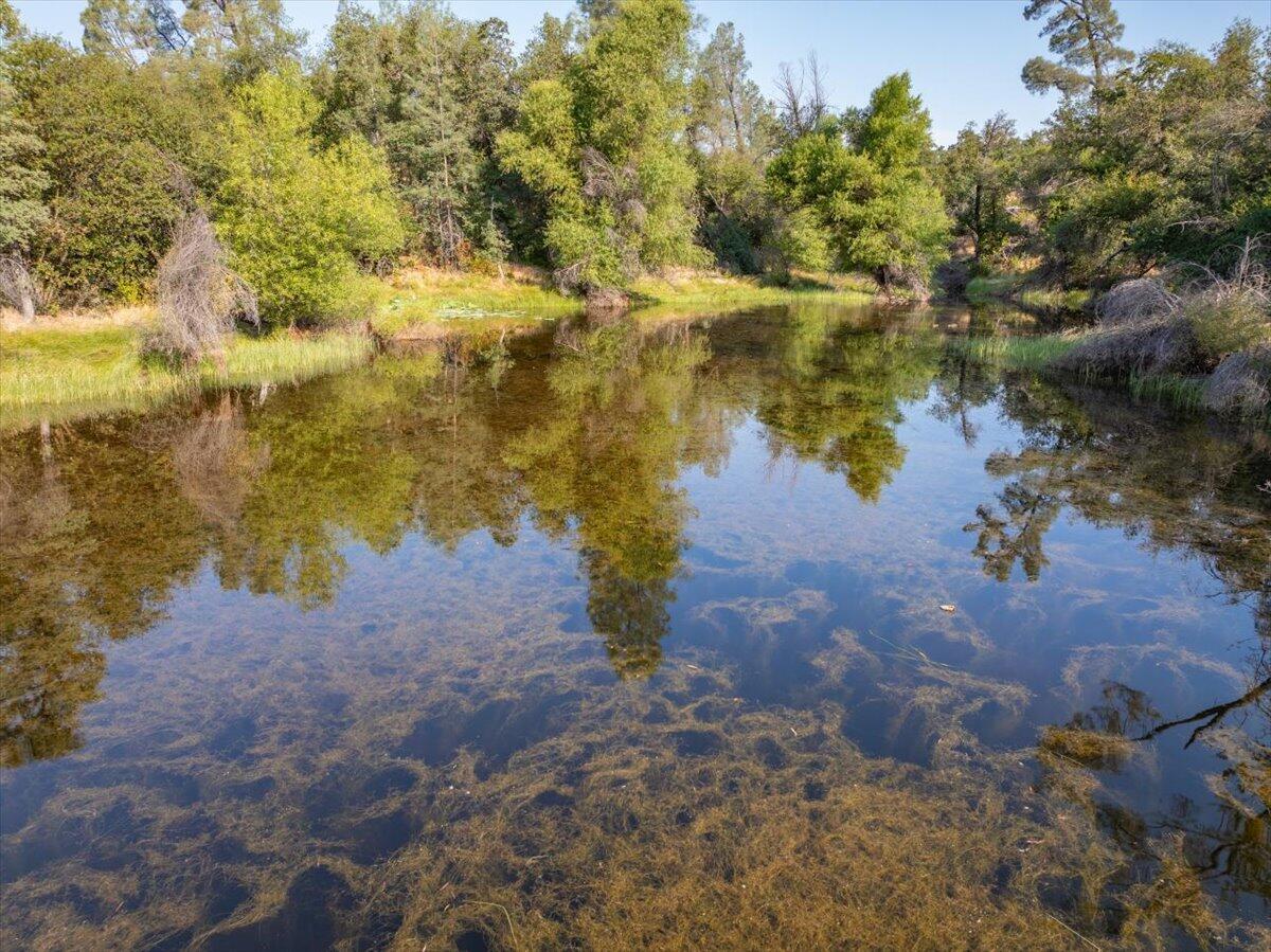 0 Two 2 Feathers Road Cottonwood, CA 96022 - Photo 31 of 41 a view of a lake from a yard