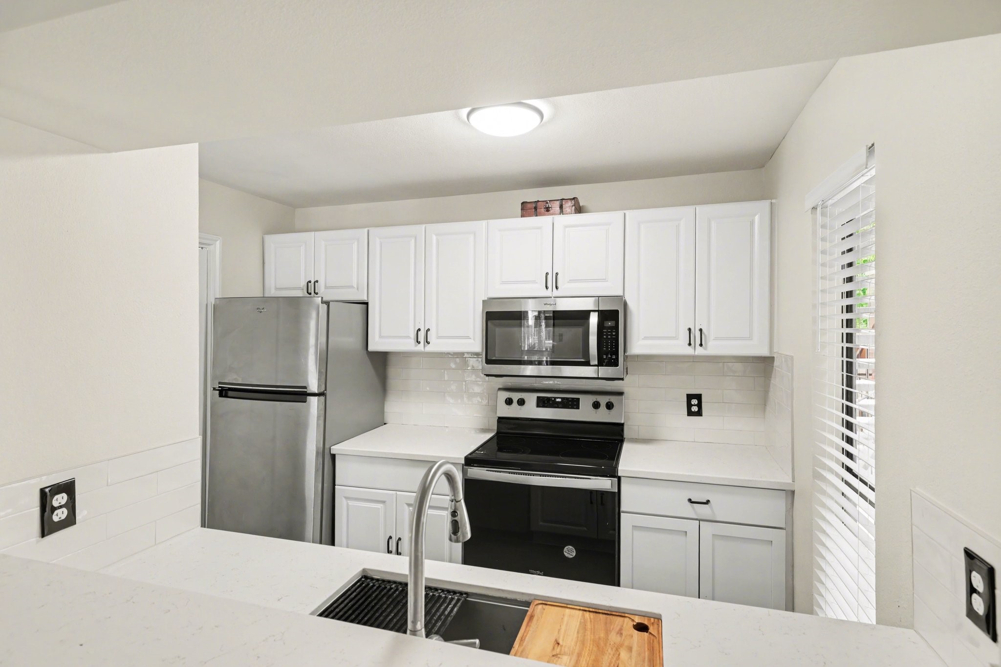 Charming condo in the Creekwood village community with an updated kitchen!