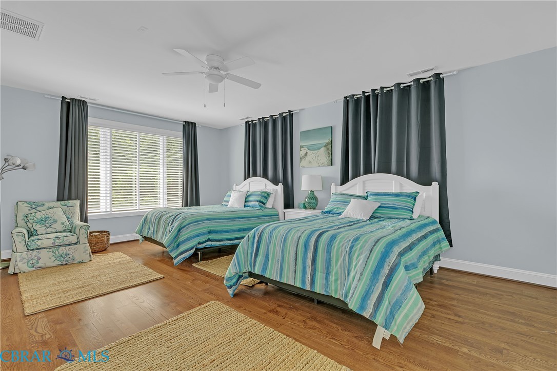 2106 Clarketown Road Heathsville, VA 22473 - Photo 28 of 56 a bedroom with two beds and a large window