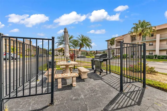 a view of a balcony with sitting area