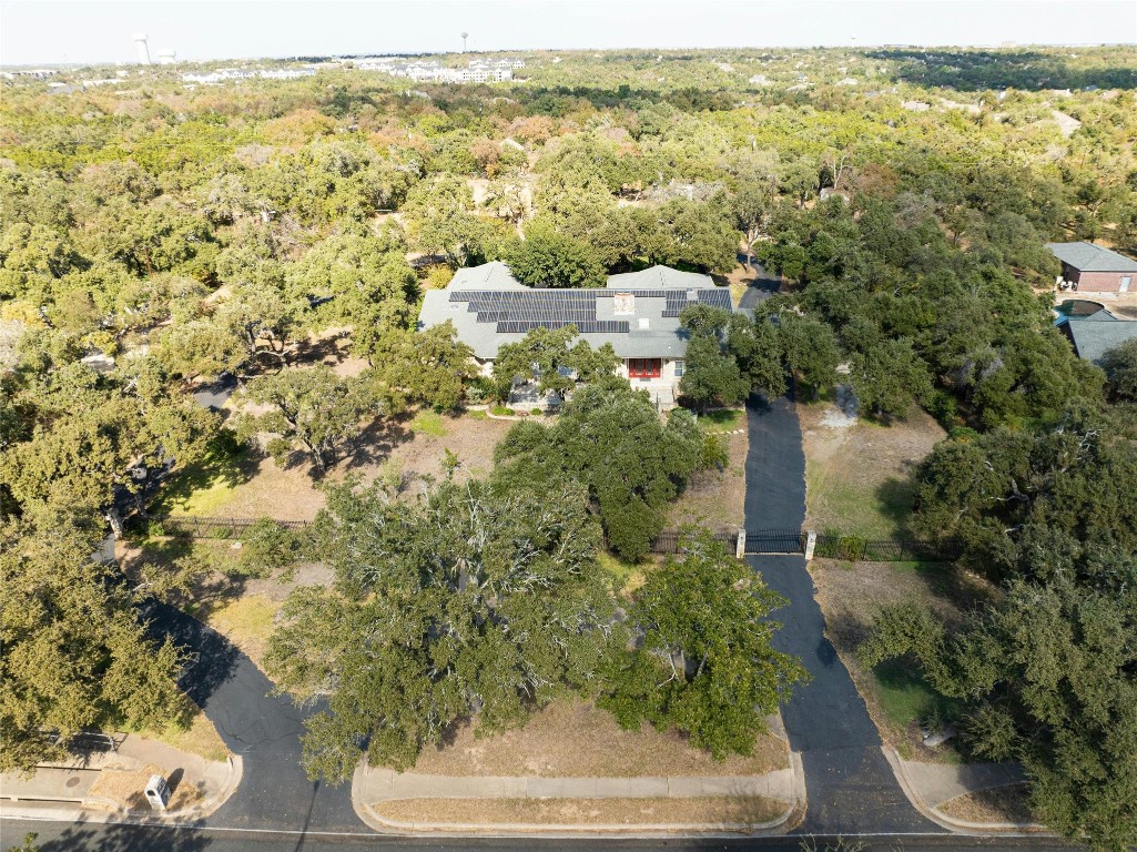 Wow - splendor in Texas Ranch-like living in the city! 64 solar panels = low electic bills!