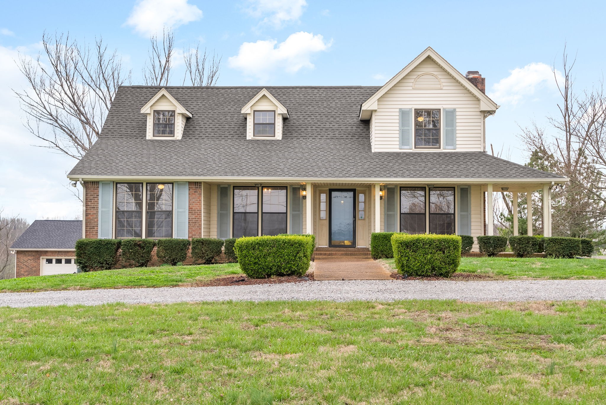 172 7 Mile Ferry Road Cunningham, TN 37052 - Photo 1 of 1 a front view of a house with a yard