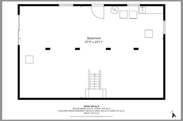 a view of a yard with plants and large trees