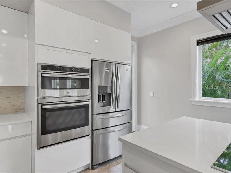 4112 Swift Road Sarasota, FL 34231 - Photo 12 of 41 a kitchen with stainless steel appliances and counter space