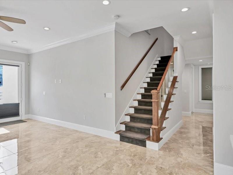 4112 Swift Road Sarasota, FL 34231 - Photo 14 of 41 a view of entryway with wooden floor