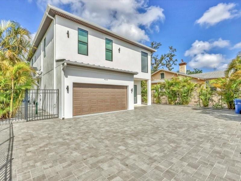 4112 Swift Road Sarasota, FL 34231 - Photo 2 of 41 a front view of a house with a garage