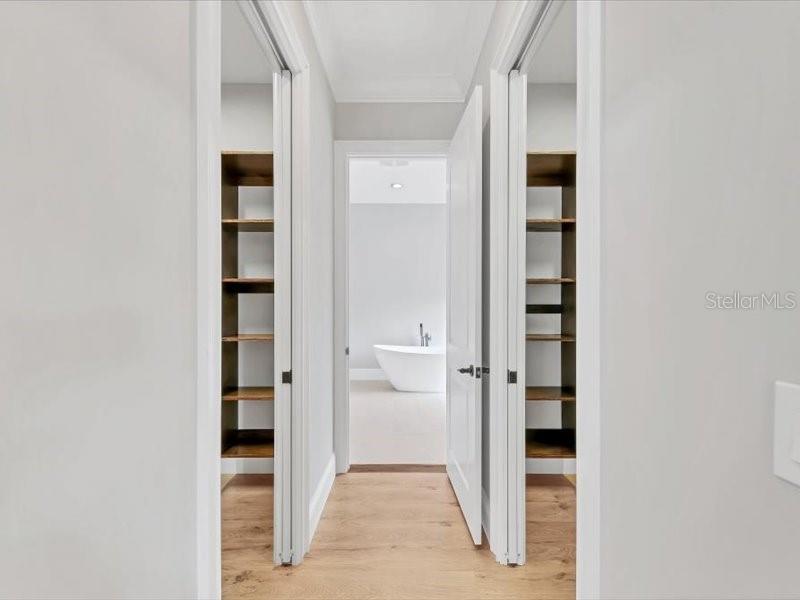 4112 Swift Road Sarasota, FL 34231 - Photo 24 of 41 wooden floor in a white cabinet