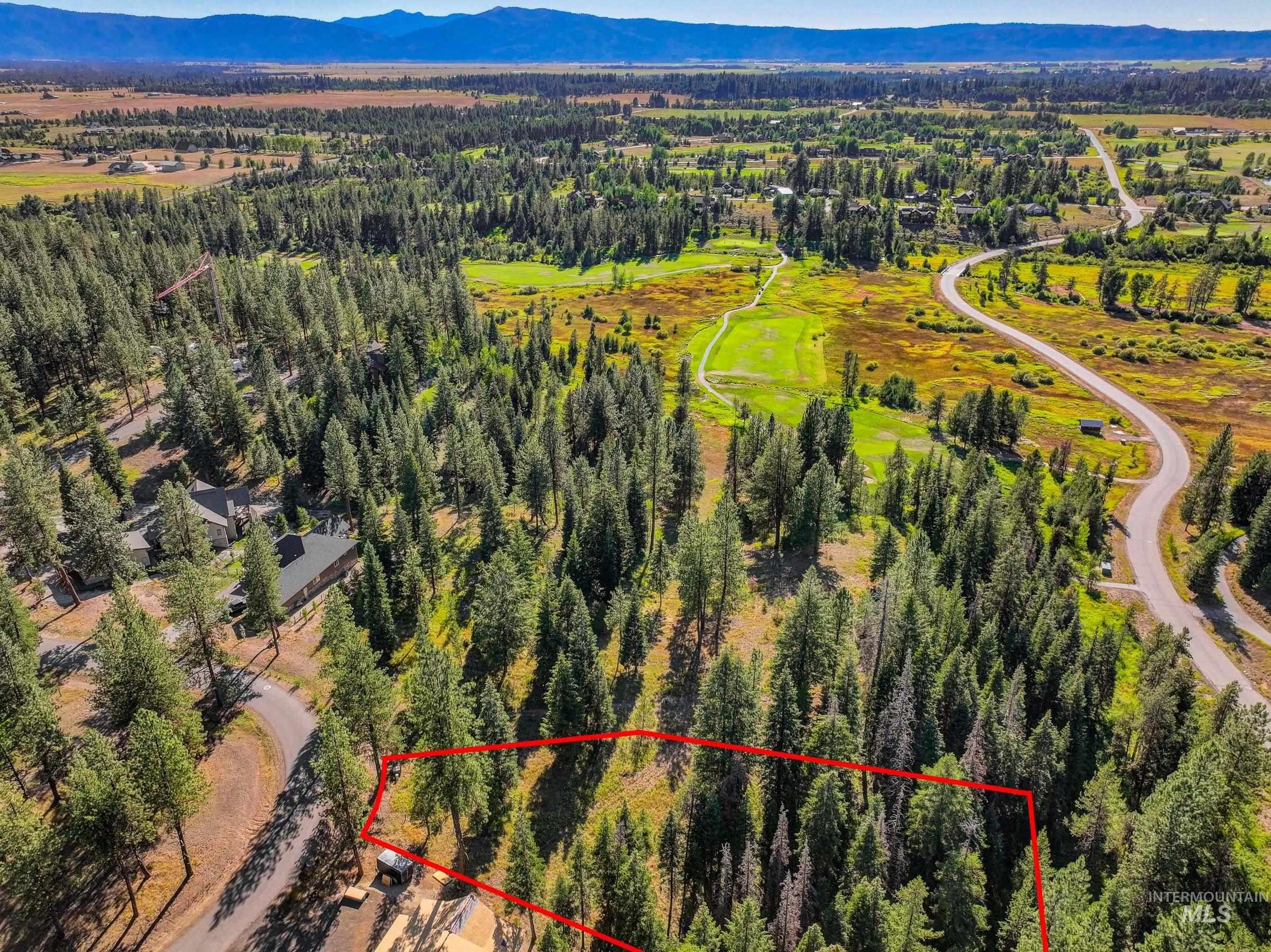 20 Vernon Court McCall, ID 83638 - Photo 4 of 30 Aerial view of property's location featuring property boundaries highlighted and a mountainous background