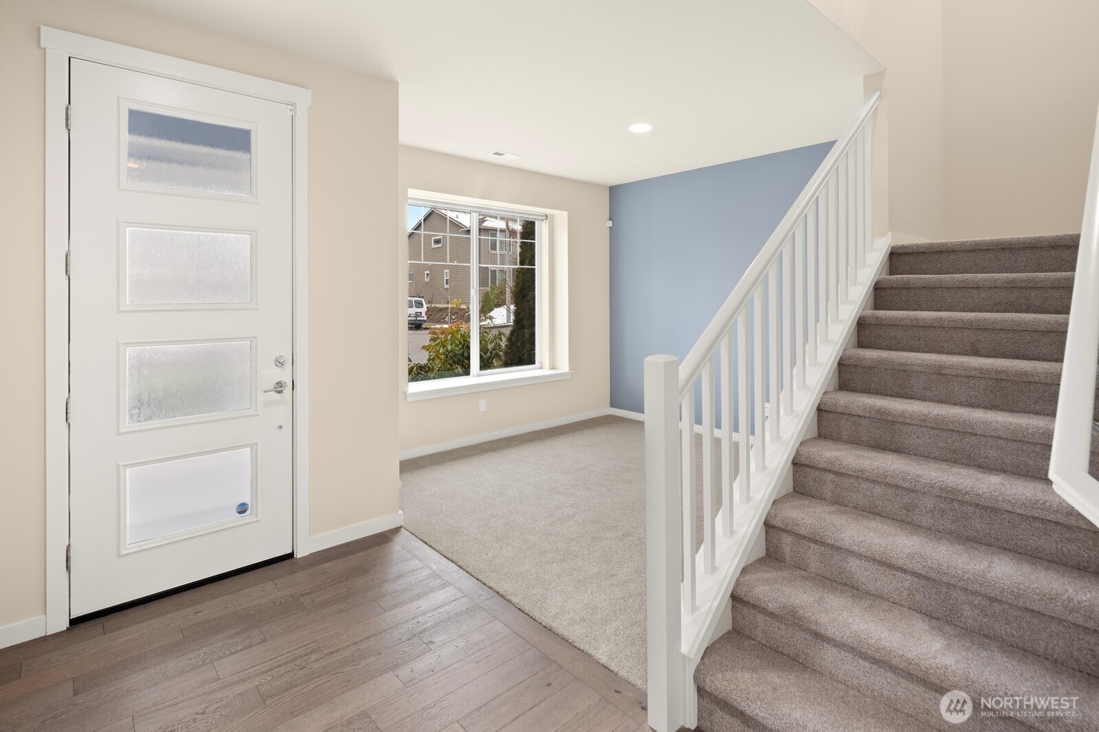21 175th Place Southeast Bothell, WA 98012 - Photo 11 of 27 a view of an entryway with wooden floor and windows