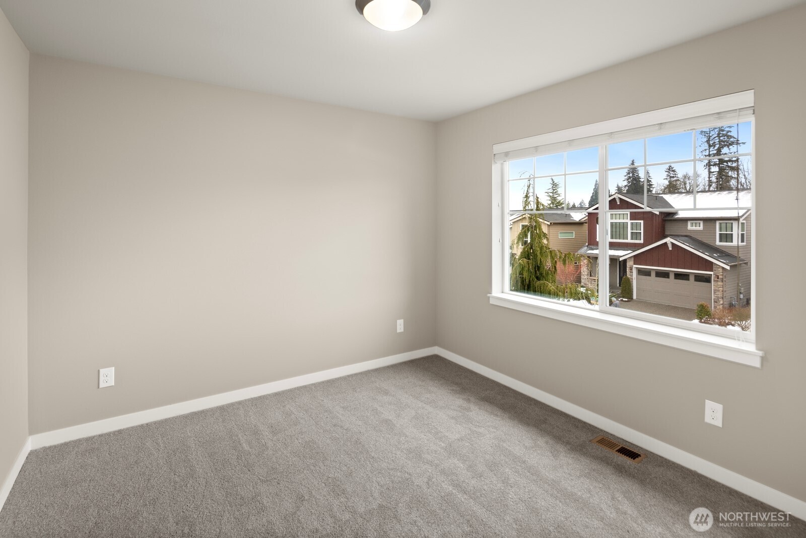 21 175th Place Southeast Bothell, WA 98012 - Photo 23 of 27 an empty room with windows