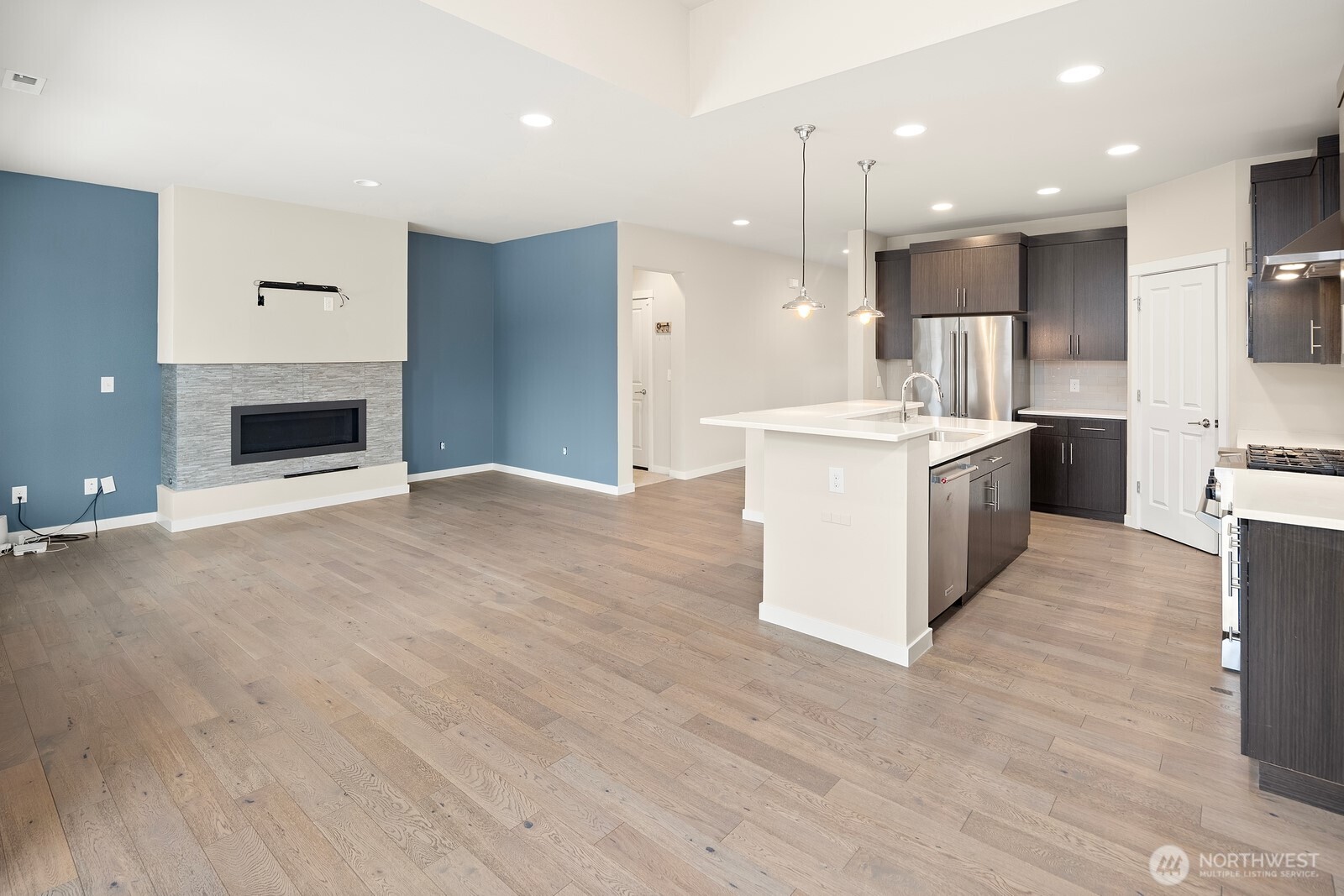 21 175th Place Southeast Bothell, WA 98012 - Photo 3 of 27 a large kitchen with a large stove top oven and cabinets