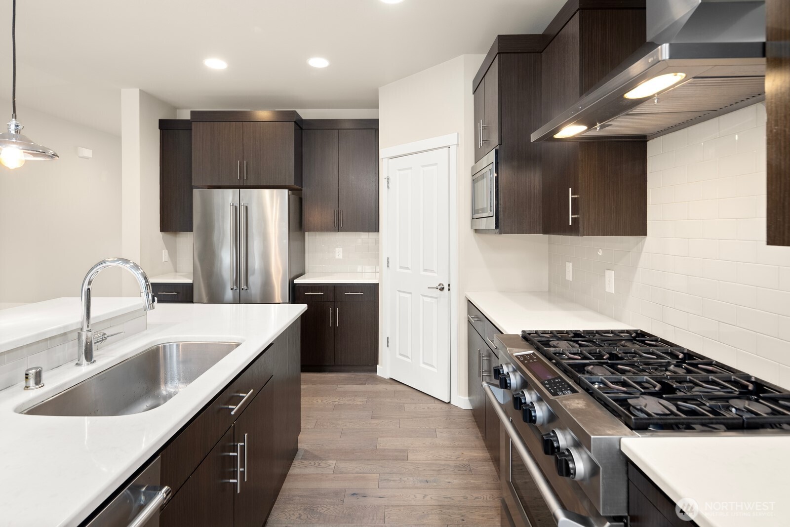 21 175th Place Southeast Bothell, WA 98012 - Photo 7 of 27 a kitchen with refrigerator and cabinets