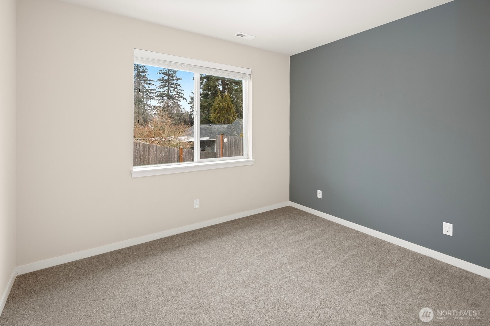 21 175th Place Southeast Bothell, WA 98012 - Photo 9 of 27 an empty room with a window