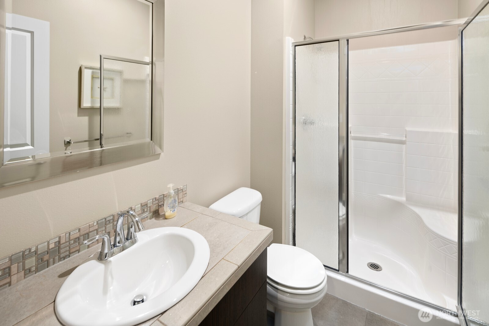 21 175th Place Southeast Bothell, WA 98012 - Photo 10 of 27 a bathroom with a sink toilet and shower
