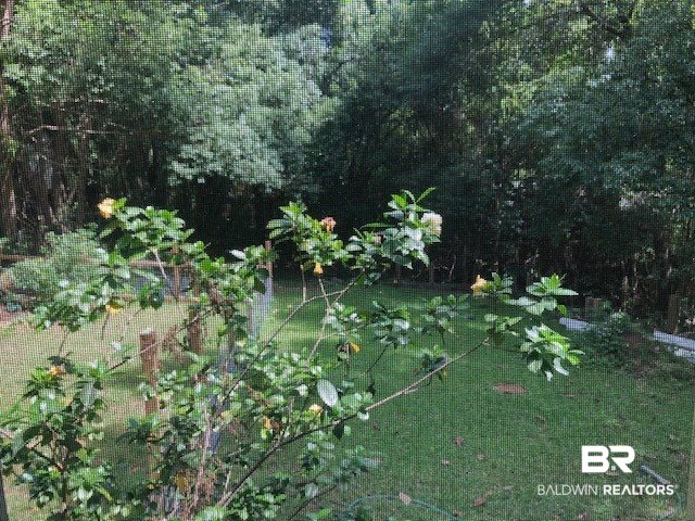 613 Johnson Avenue Fairhope, AL 36532 - Photo 13 of 13 View from screened porch