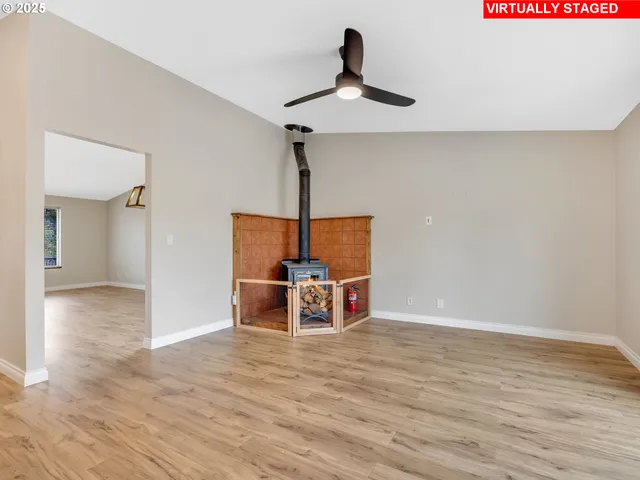 a view of a room with a wooden floor