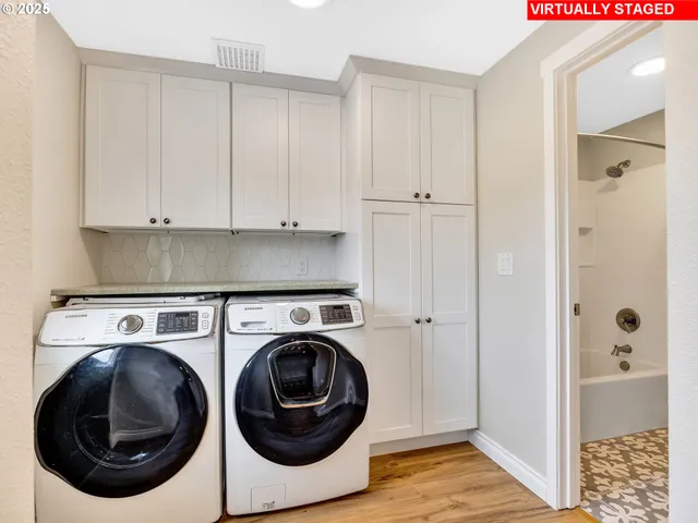 a utility room with dryer and washer