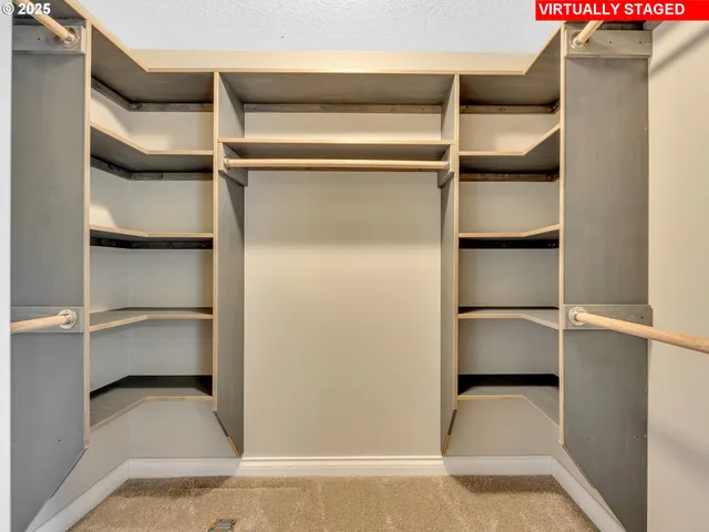 a view of an empty walk in closet