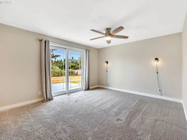 a view of a big room with carpet