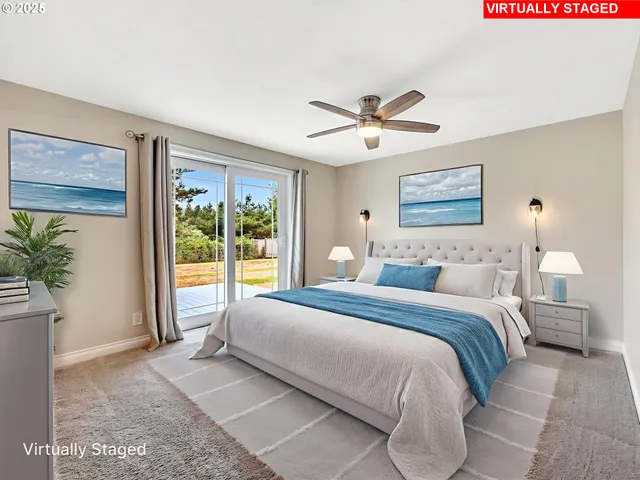 a spacious bedroom with a large bed and a window