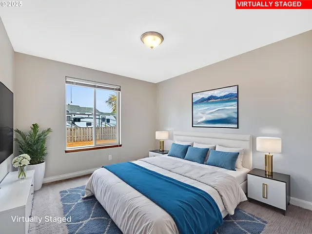 a bedroom with bed and a window