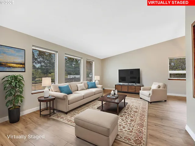 a living room with furniture or couch and a flat screen tv