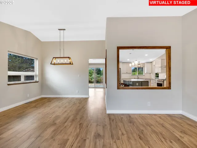 a view of livingroom with furniture and wooden floor