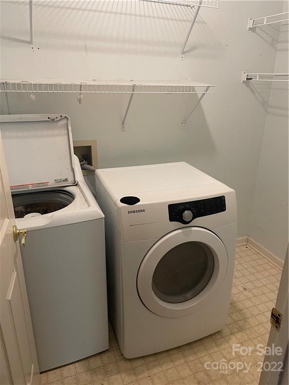 311 Chaney Road Monroe, NC 28110 - Photo 8 of 13 a utility room with dryer and washer