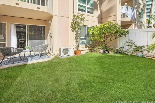 a view of yard with seating area