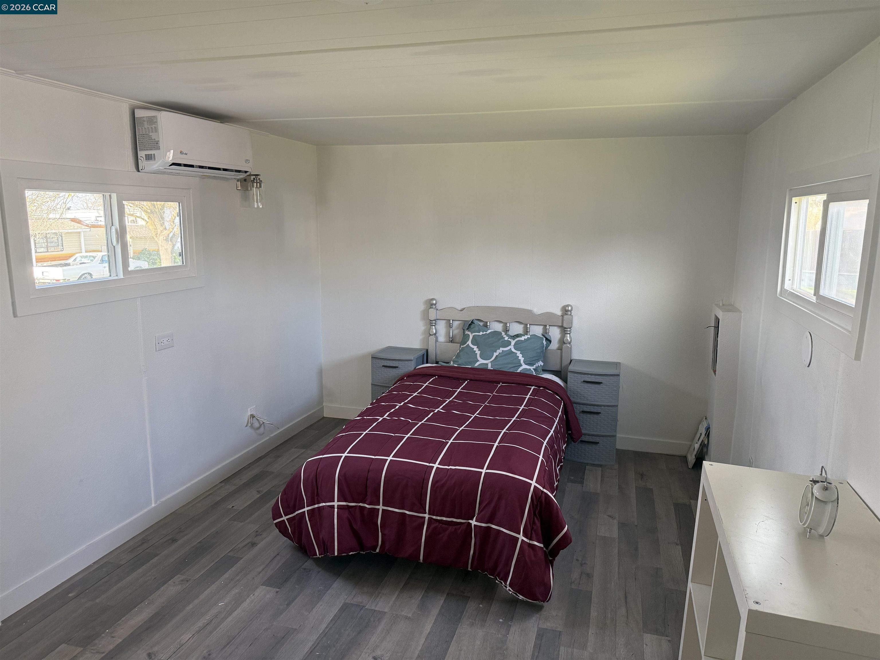 3505 Gateway Road, Unit 13M Bethel Island, CA 94511 - Photo 9 of 17 a room with a table and a chair