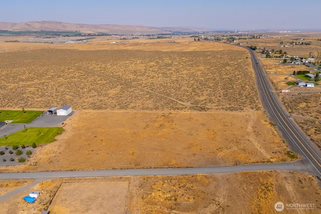 a view of a city and ocean