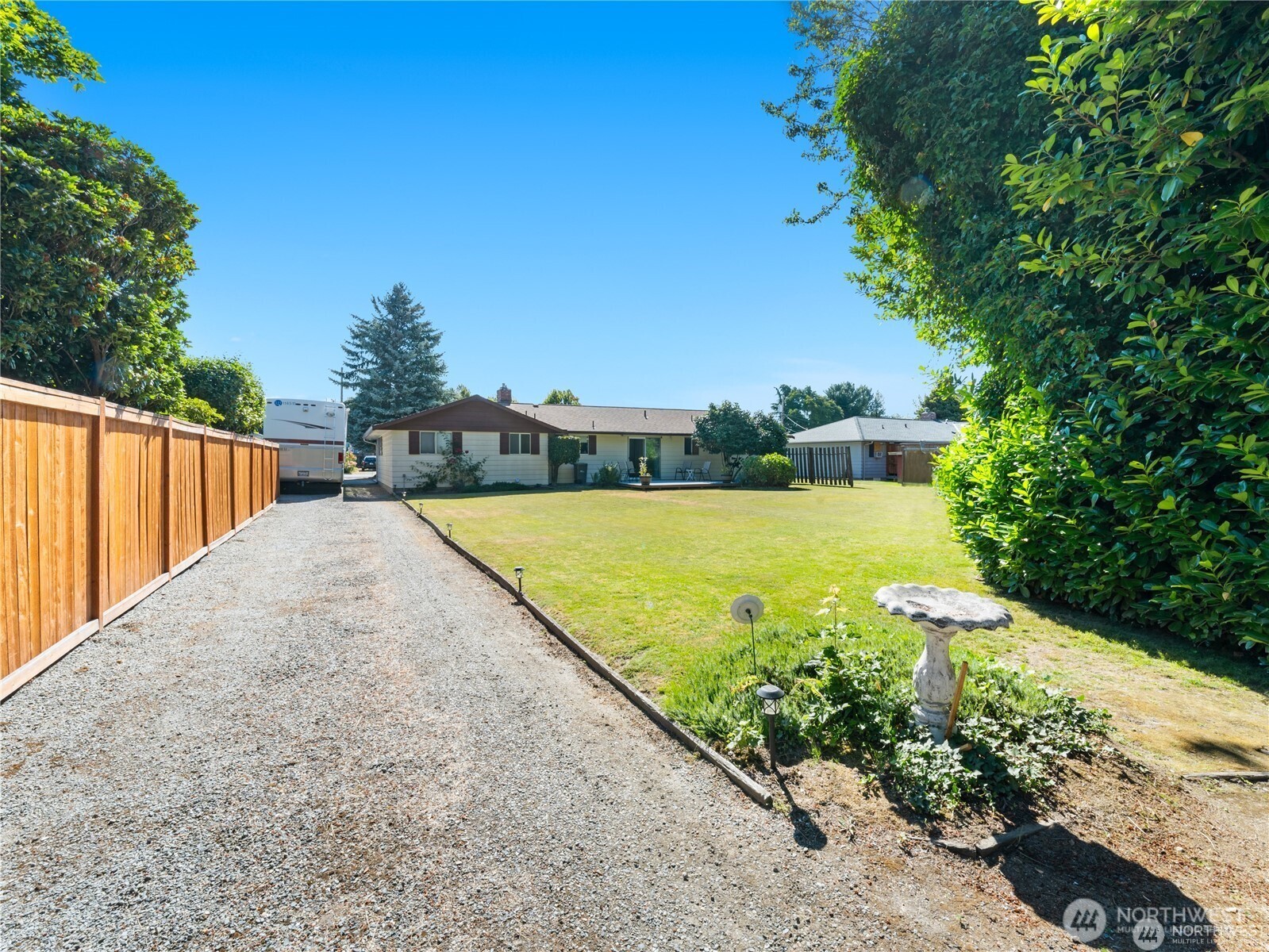 1205 South Walnut Street Burlington, WA 98233 - Photo 11 of 40 a view of a swimming pool with a patio