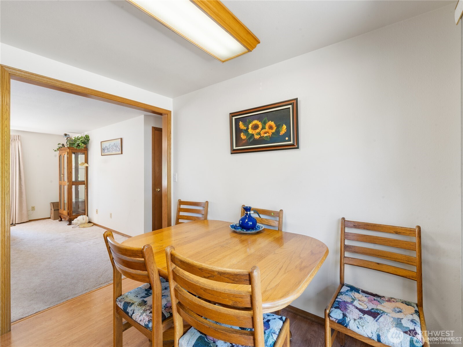 1205 South Walnut Street Burlington, WA 98233 - Photo 13 of 40 a view of a dining room with furniture and wooden floor