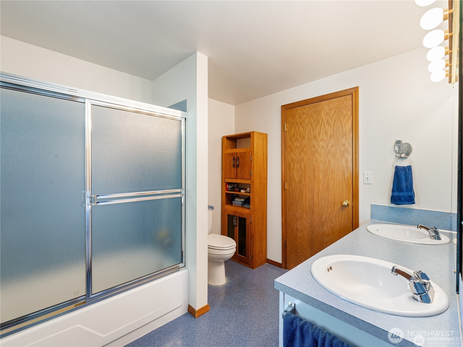 1205 South Walnut Street Burlington, WA 98233 - Photo 23 of 40 a bathroom with a sink a toilet and shower