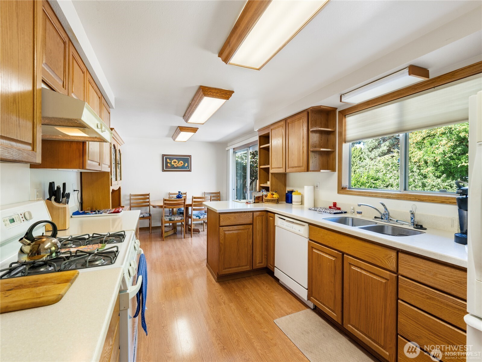1205 South Walnut Street Burlington, WA 98233 - Photo 33 of 40 a kitchen with lots of counter top space and living room