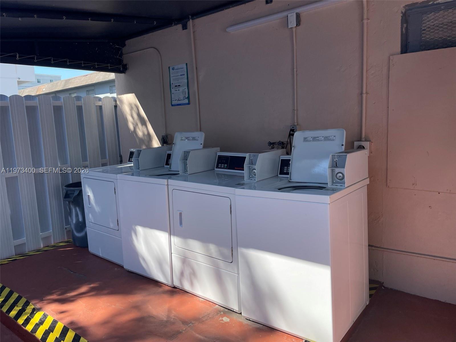1450 Southwest 6th Street, Unit 2 Miami, FL 33135 - Photo 9 of 12 a bathroom with a sink and mirror
