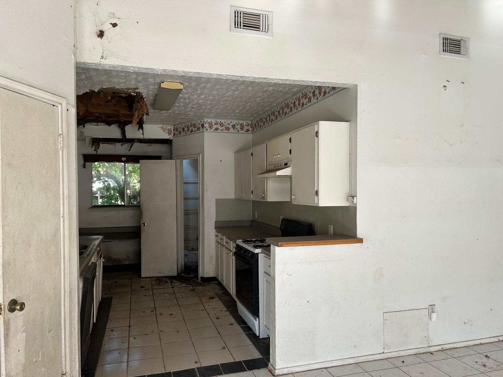 3838 Buckhurst Drive Houston, TX 77066 - Photo 11 of 21 a kitchen with stainless steel appliances granite countertop a refrigerator and a stove