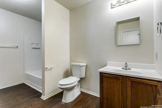 a bathroom with a sink and a toilet