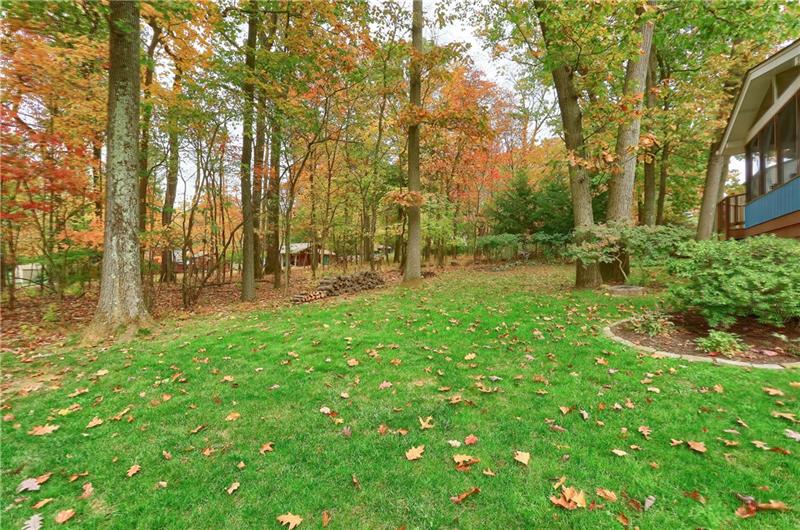 9384 Hilliard Road Pittsburgh, PA 15237 - Photo 24 of 25 Mature landscaping and trees create a beautiful outdoor space.