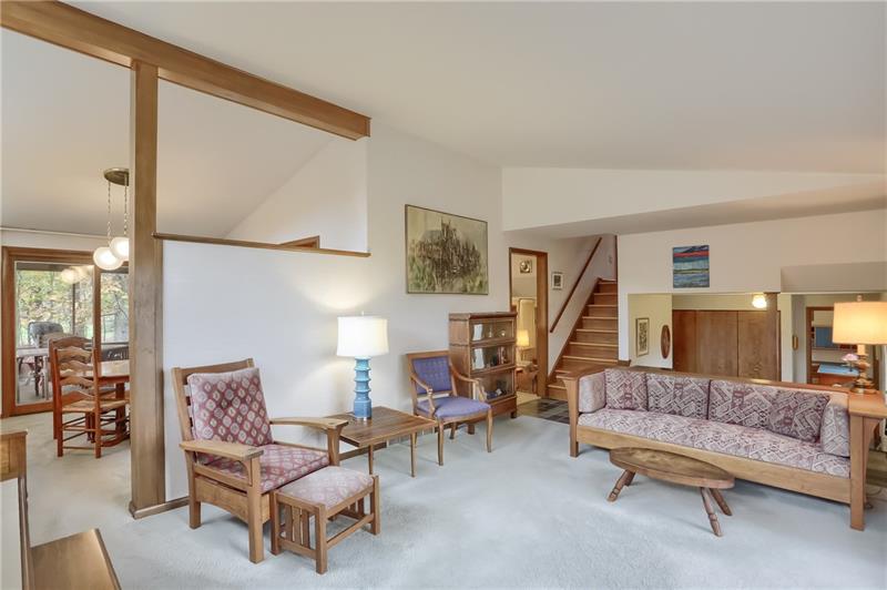 9384 Hilliard Road Pittsburgh, PA 15237 - Photo 5 of 25 Vaulted ceilings in the living and dining room create a spacious living area.