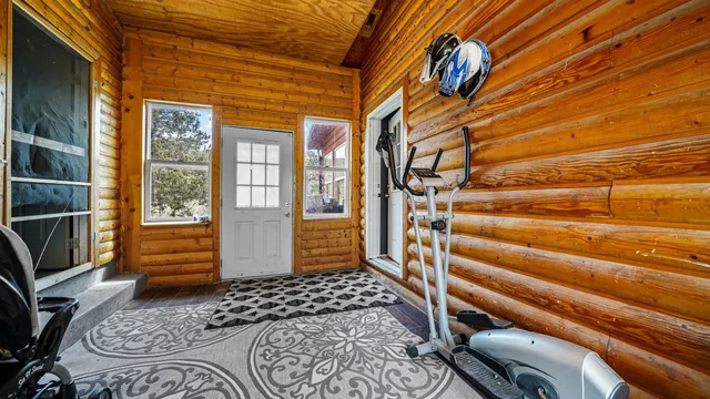 a view of entryway with wooden floor