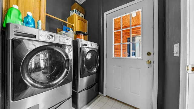 a utility room with dryer and washer