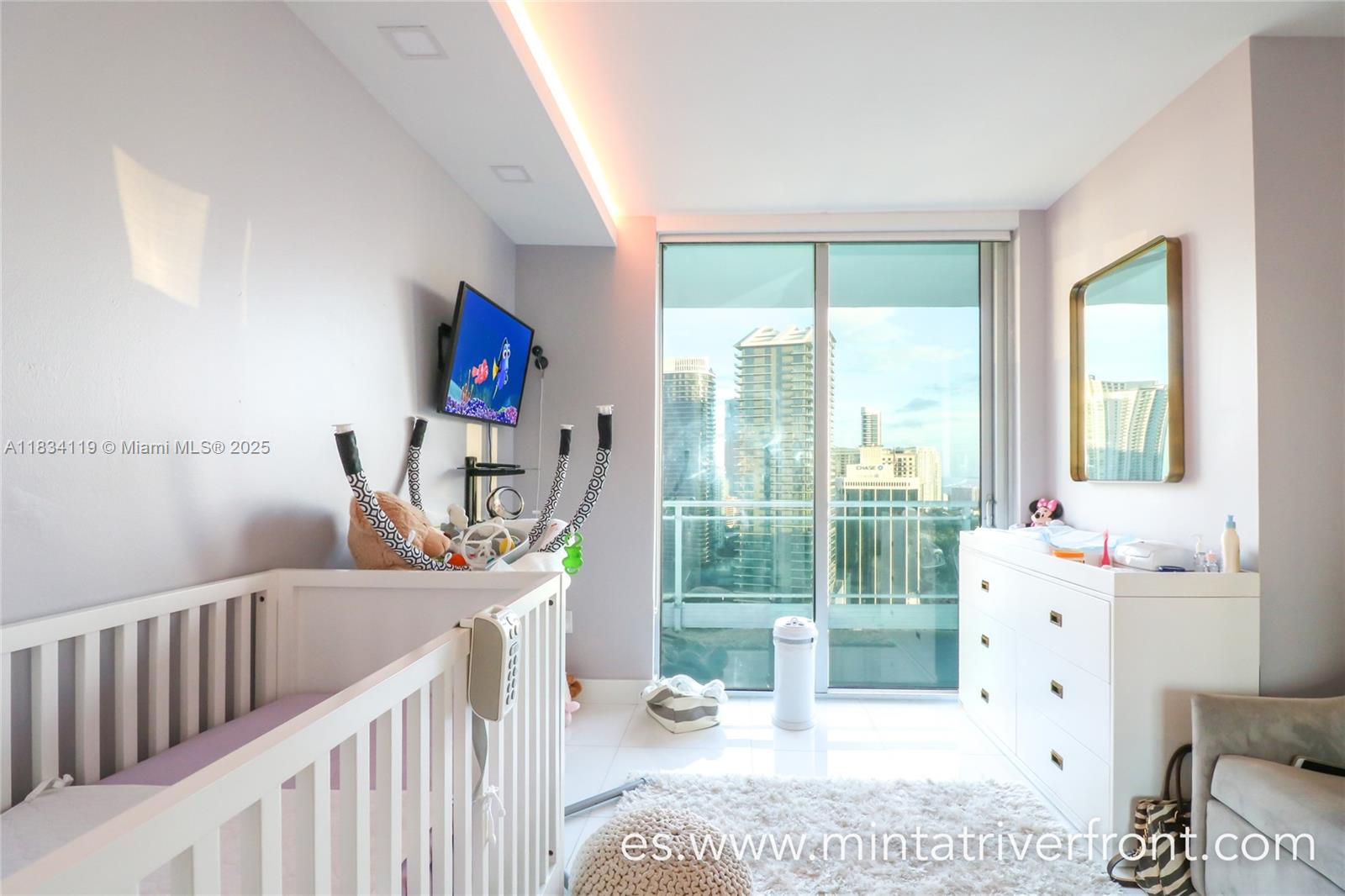 92 Southwest 3rd Street, Unit 3003 Miami, FL 33130 - Photo 14 of 15 a living room with furniture and a large window